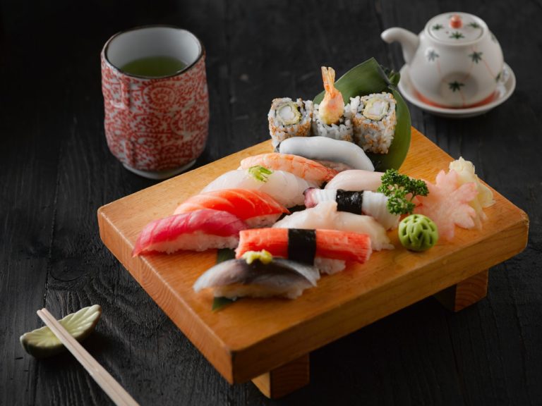 a board of fresh sushi