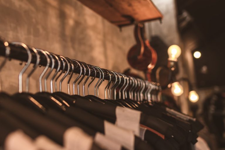 a clothing rack with hangers