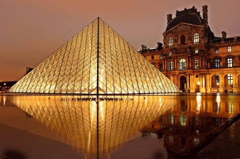 The Louvre in Paris, lit up in the dark
