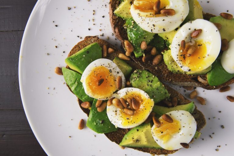 sourdough toast with avocado and eggs