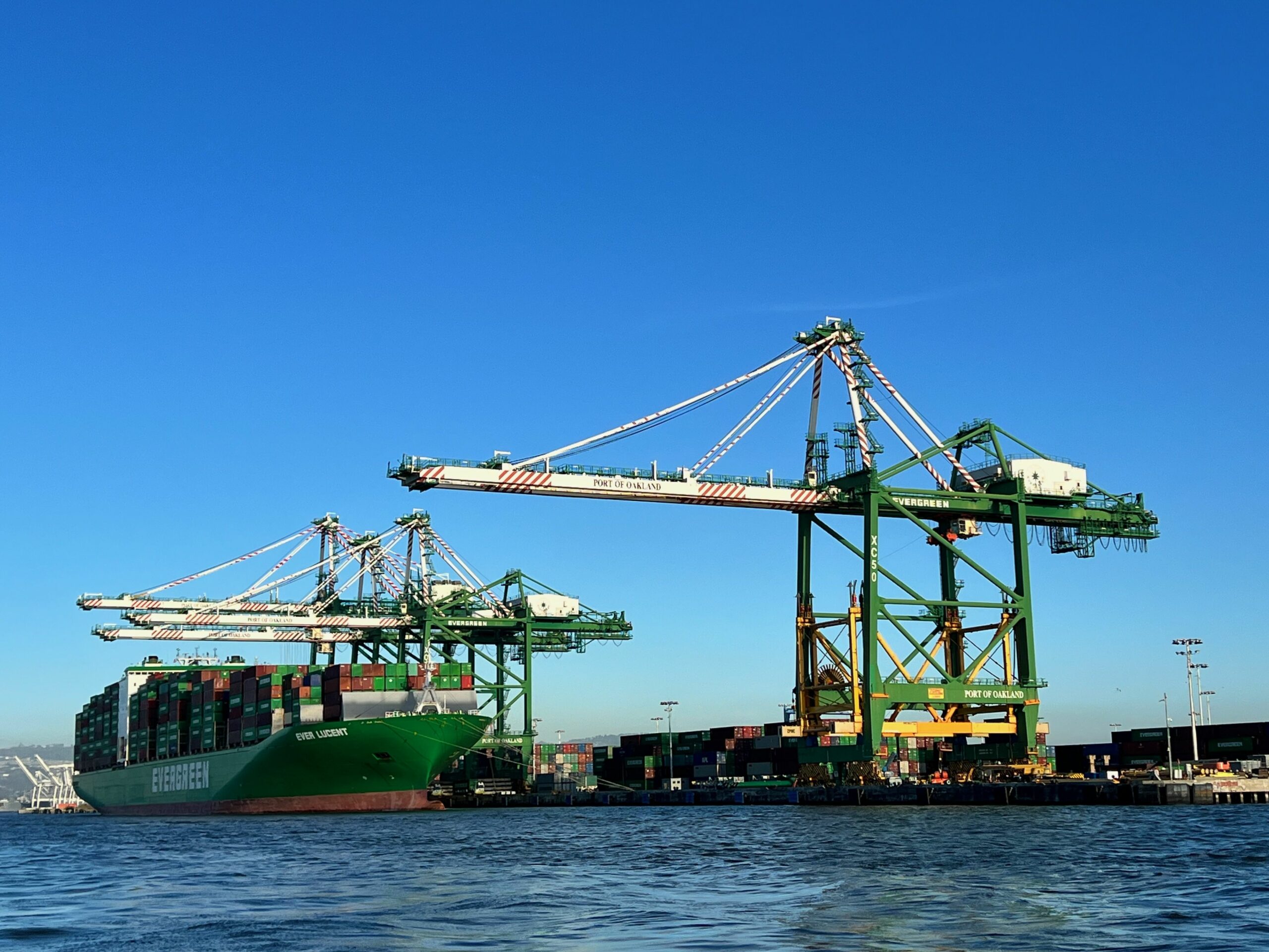 cargo crane and ship in the water
