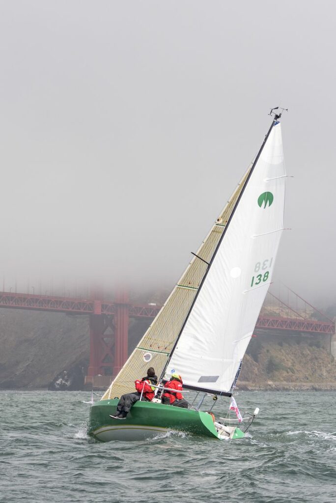 sailing boat by golden gate bridge